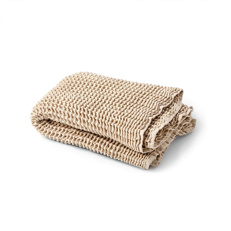 Flera handdukar i beige