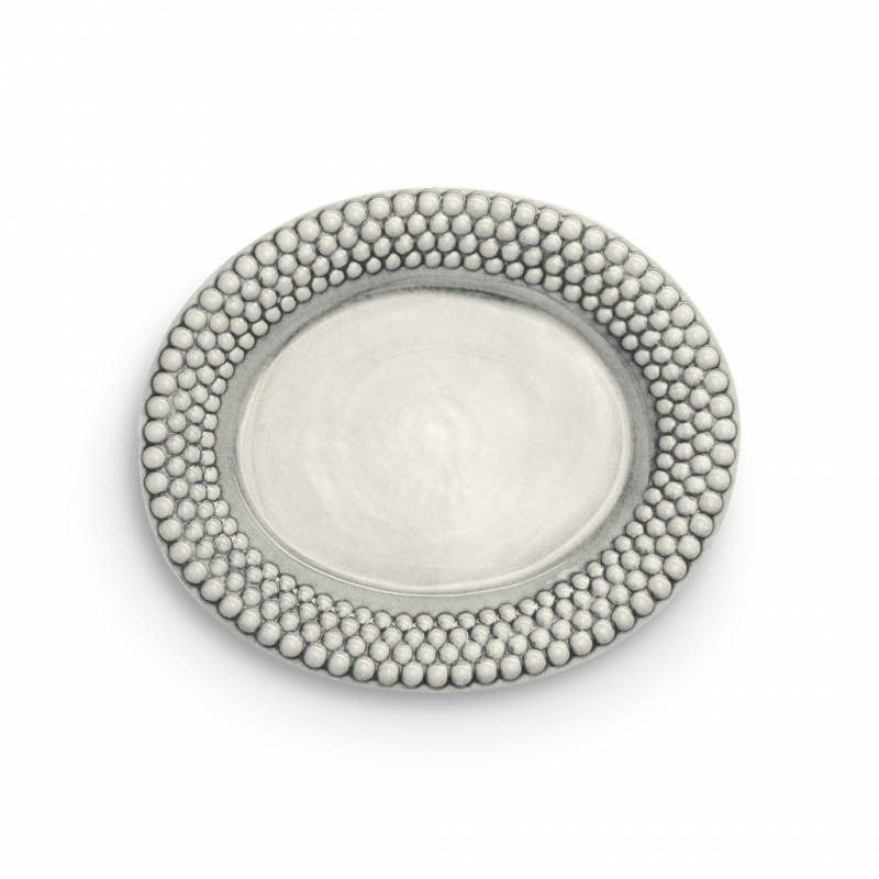 Oval tallrik i färgen grå från Mateus kollektion bubbles.